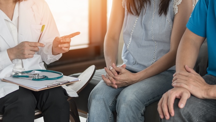 Couple receiving genetic counseling