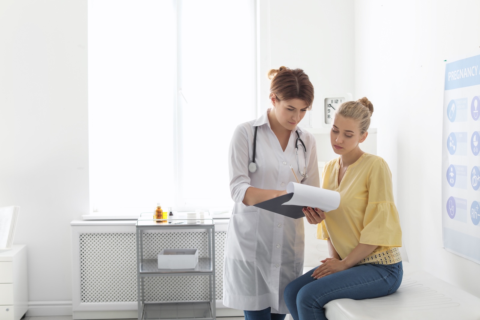 Egg donation patient having appointment with doctor in hospital